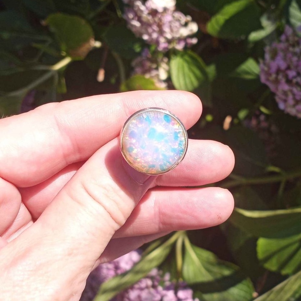 Glass fire opal with silver band ring size 6 and 1/2 adjustable
